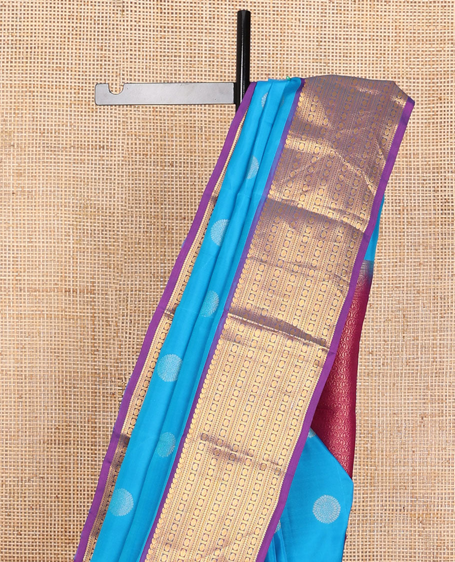 Blue zari buttas Vasundhara elite silksaree, contrast border of manga mokku,muthu,kathir,banaras & poun & scallop pallu