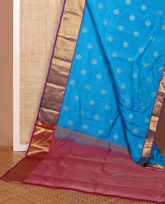Blue zari buttas Vasundhara elite silksaree, contrast border of manga mokku,muthu,kathir,banaras & poun & scallop pallu