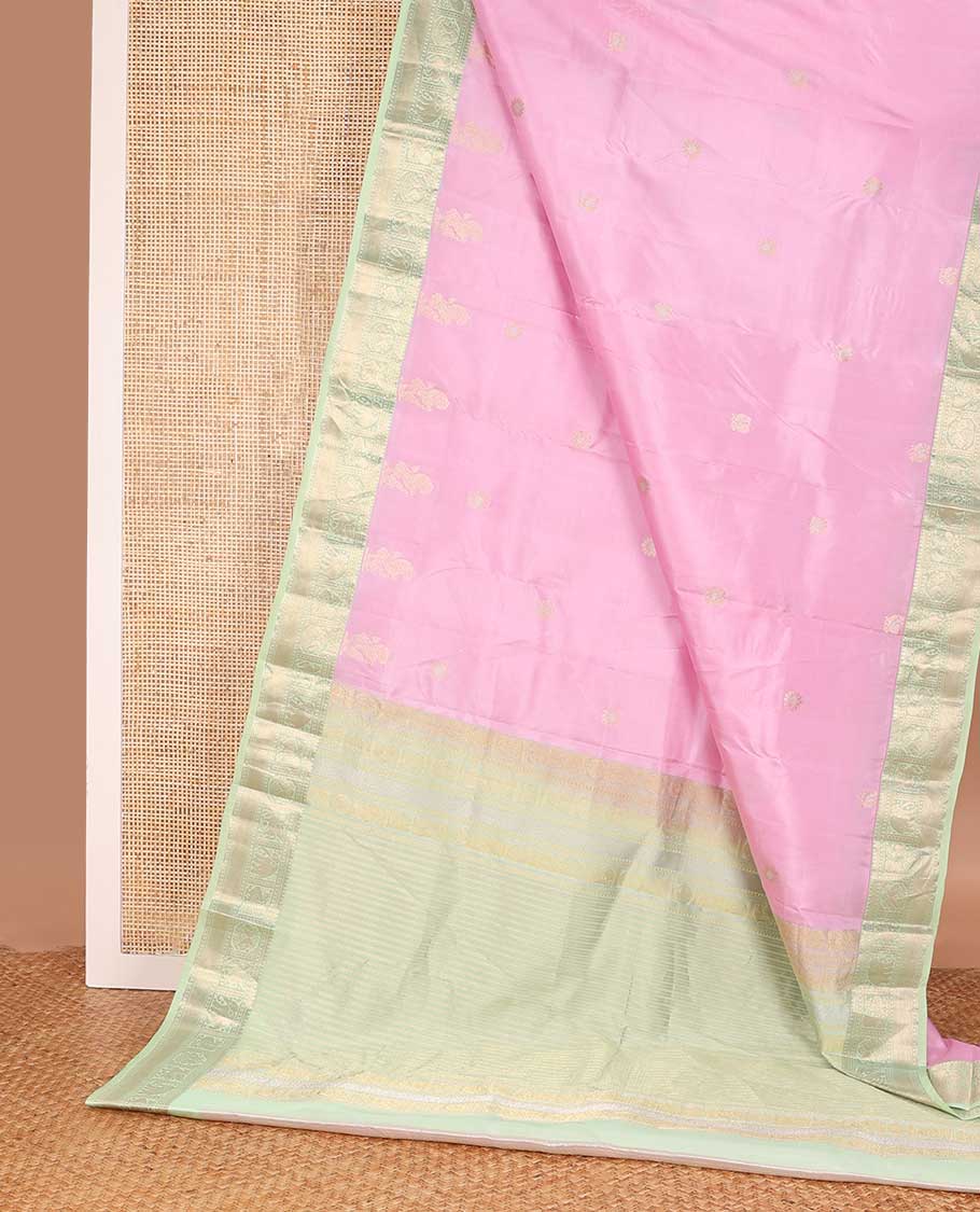 Pink kamalam and singam buttas silk saree, contrast border of thilakam, paisa, vanki, yaanai, kuthirai and iru thalai pakshi, and zari woven pallu