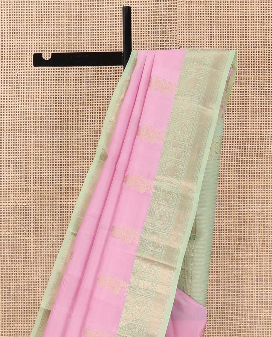 Pink kamalam and singam buttas silk saree, contrast border of thilakam, paisa, vanki, yaanai, kuthirai and iru thalai pakshi, and zari woven pallu