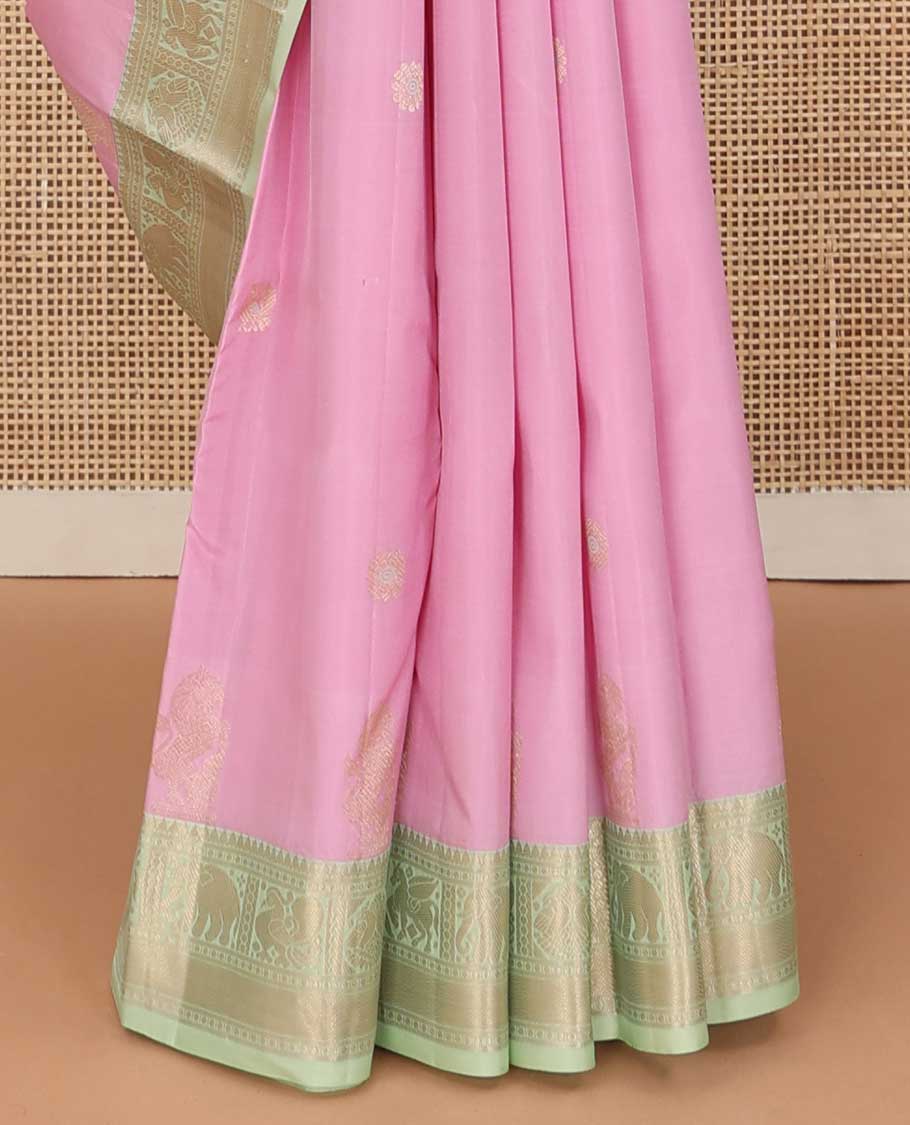 Pink kamalam and singam buttas silk saree, contrast border of thilakam, paisa, vanki, yaanai, kuthirai and iru thalai pakshi, and zari woven pallu