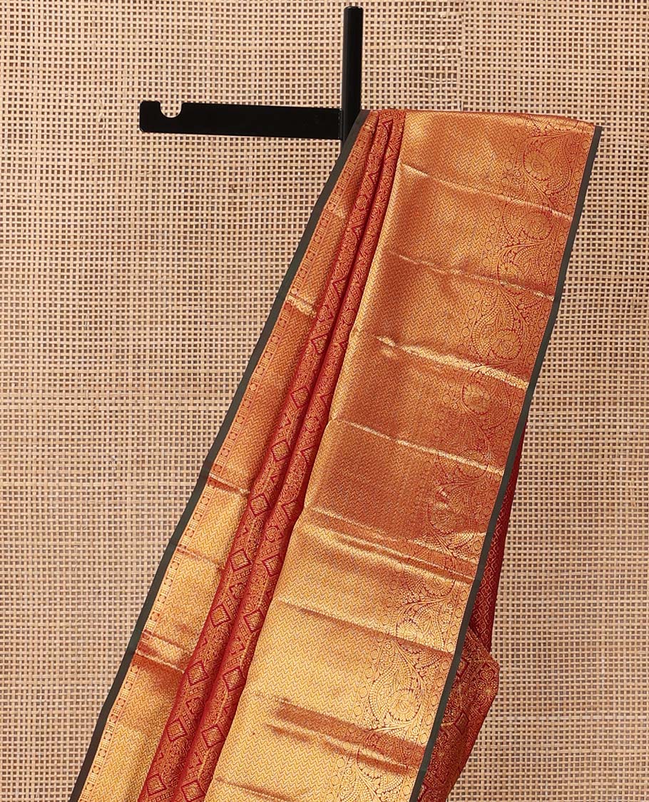 Red jacquard wedding silk saree, zari border of thilakam, cross rudraksham, muthu, vanki, and kodi visiry, and jaal pallu