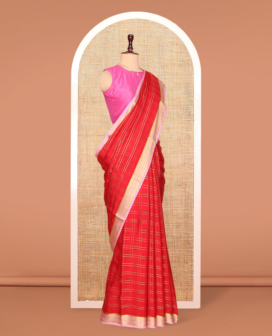 Red Mysore Silk Saree, Gleamed up with Zari Checked Design on its Body, Complemented by Captivating Contrast Border of Traditional Zari Designs, Pallu of Tropical Flora and Flamingo Bird Designs, and Paired with a Contrast Blouse