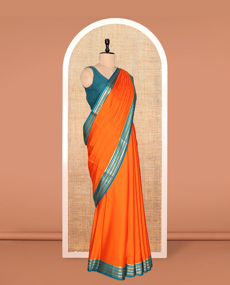 Orange Plain Mysore Silk Saree, Complemented by a Contrast Traditional Zari Border, Zari Striped Pallu, and a Contrast Blouse