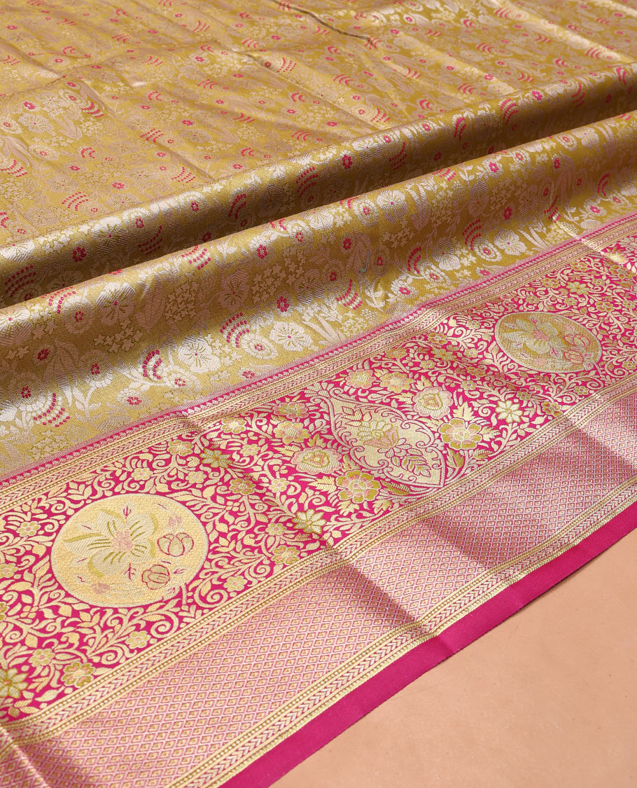 Gold Art Silk Material Half Saree, Ornamented with Jacquard Skirt, a Contrast Meenakari Border, Contrast Blouse, and an Intricate Dhavani