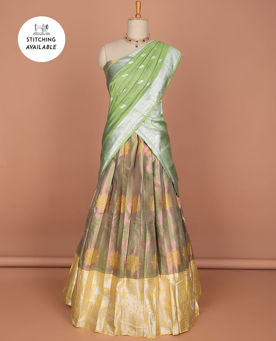 Green floral motifs half saree with contrast intricate zari design border, zari design blouse & floral zari design dhavani