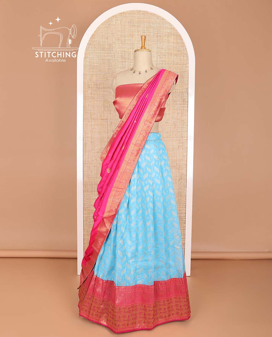 Light blue buttas half saree with contrast intricate zari design border, jaal design blouse & floral design dhavani