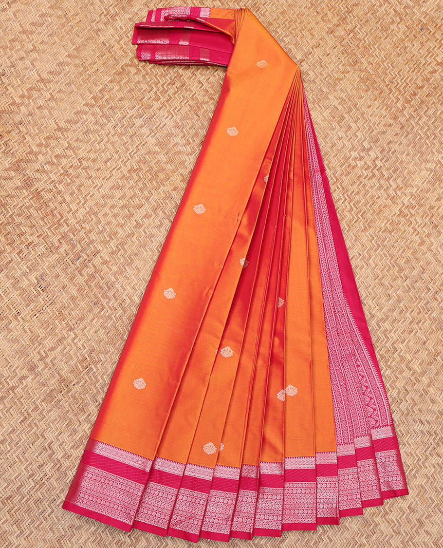 Orange Budget Silk Saree, Subtly Detailed with Zari Buttas All Over Its Body, Complemented by a Contrast Traditional Zari Design Border, Geometric-Patterned Pallu, and Paired with a Contrast Blouse