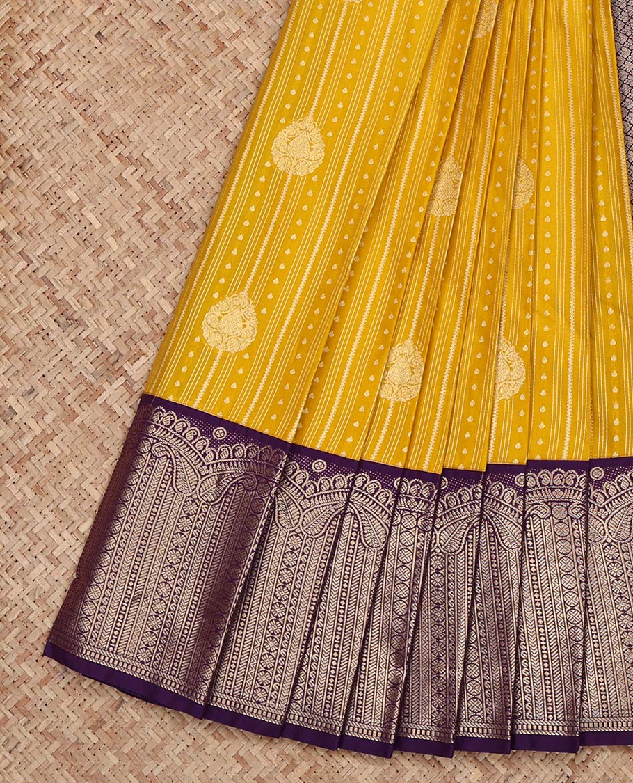 Yellow Budget Silk Saree, Decorated with Zari Buttas and Zari Stripes on Its Body, Complemented by a Contrast Geometric Zari Design Border, Grand Jaal Pallu, and Paired with a Contrast Blouse
