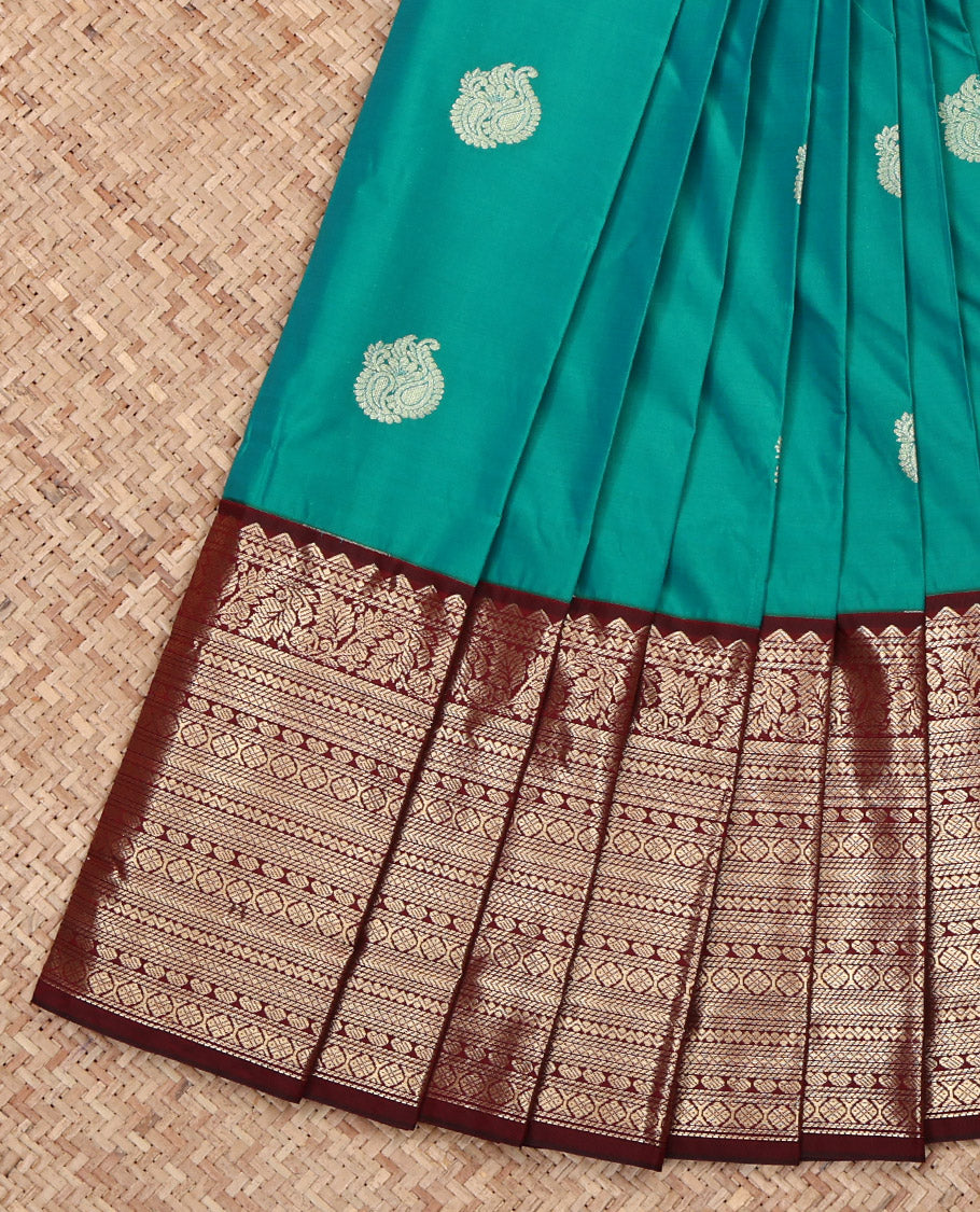 Green Budget Silk Saree, Embellished with Zari Buttas All Over Its Body, Complemented by a Contrast Traditional Zari Design Border, Pallu of Jaal Designs, and Paired with a Contrast Blouse
