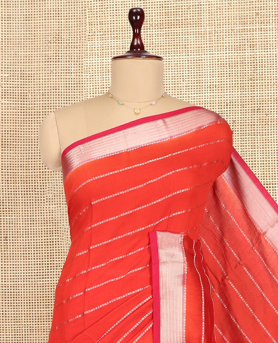 Orange Assam Silk Saree, Showcasing Zari Stripes, Complemented by Semi-Contrast Zari Border, Zari Woven Pallu, and Contrast Blouse