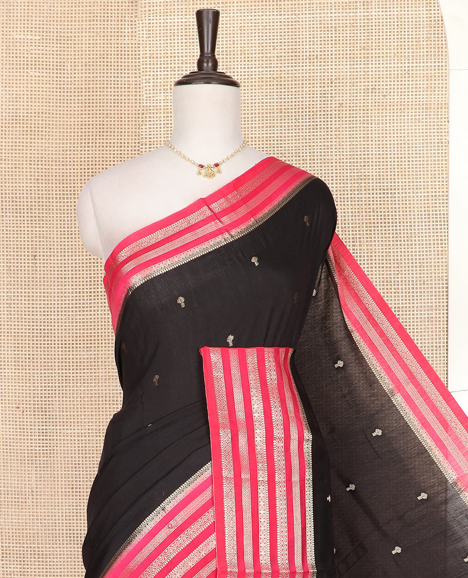 Black buttas assam silk saree, contrast traditional zari design border, and zari striped pallu