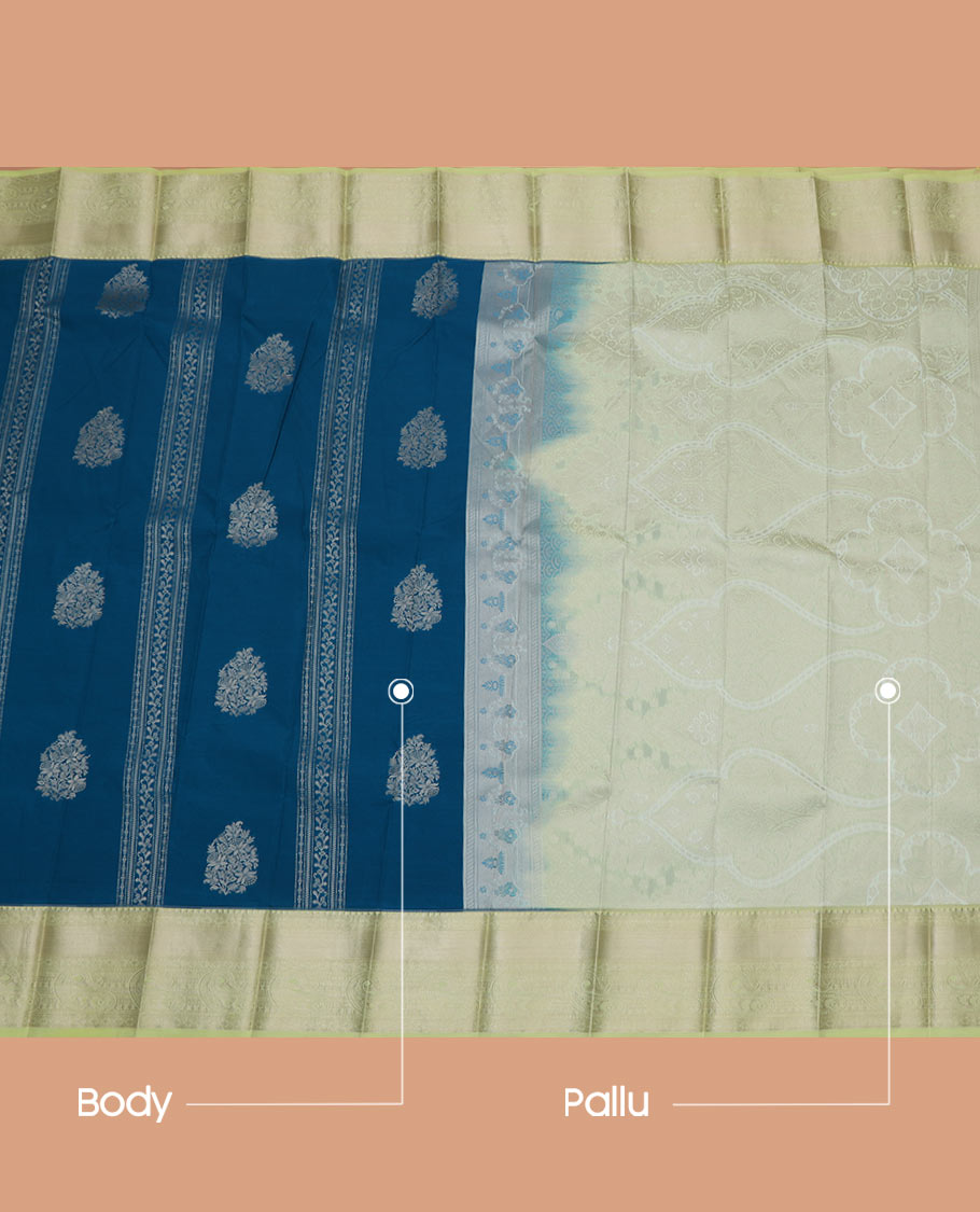 Blue Budget Silk Saree Steeped with Floral Designs Across Its Body, Highlighted with a Contrast Traditional Paisleys Zari Design Border, Mughal-Style Pallu, and a Contrast Zari-Bordered Blouse