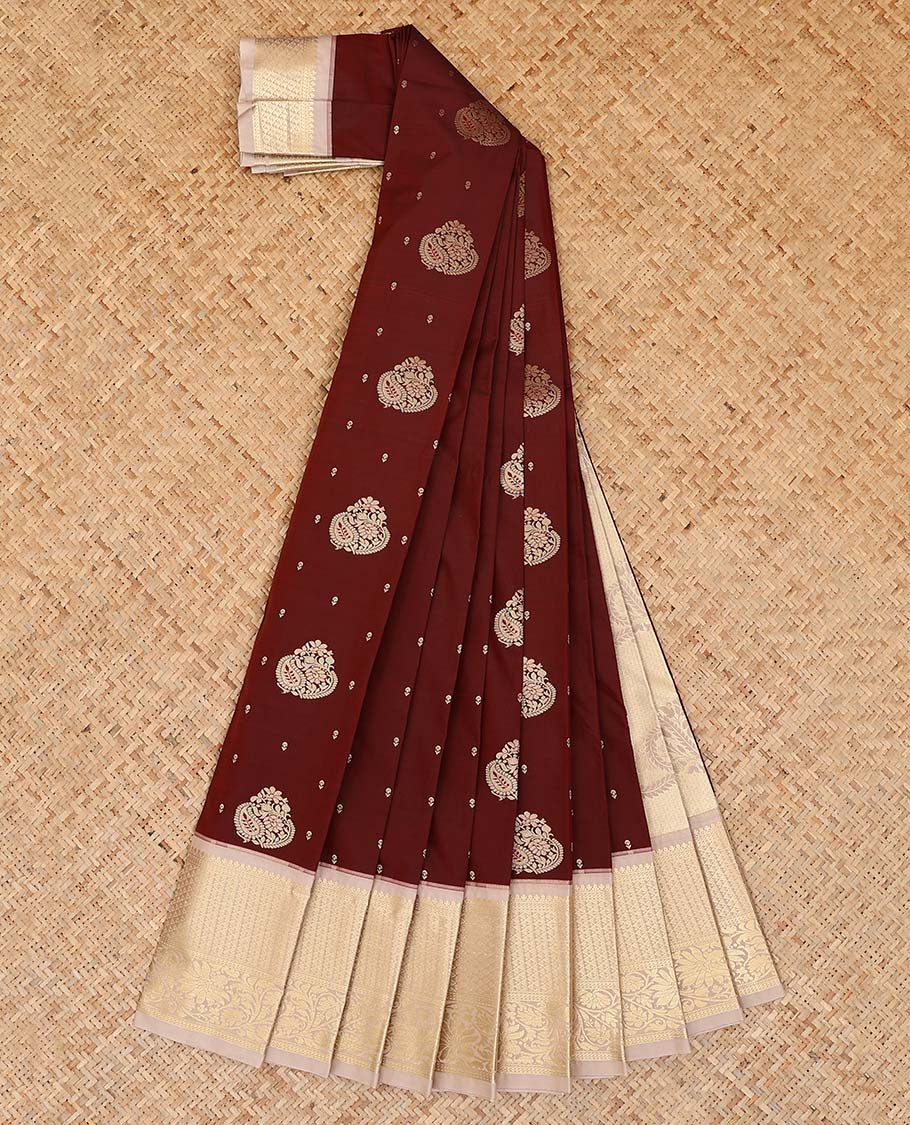 Maroon zari buttas gift saree, contrast traditional zari design border, and pallu steeped with paisley designs