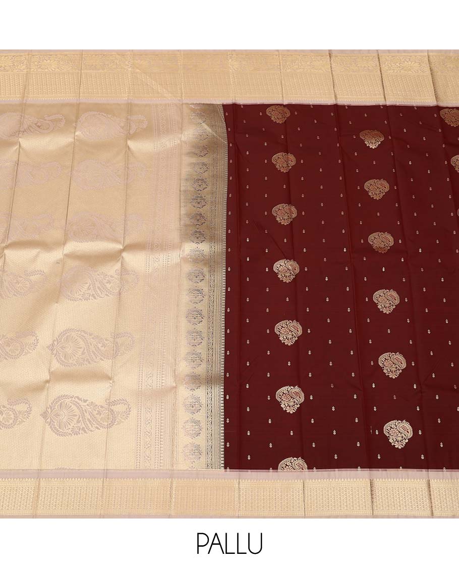 Maroon zari buttas gift saree, contrast traditional zari design border, and pallu steeped with paisley designs