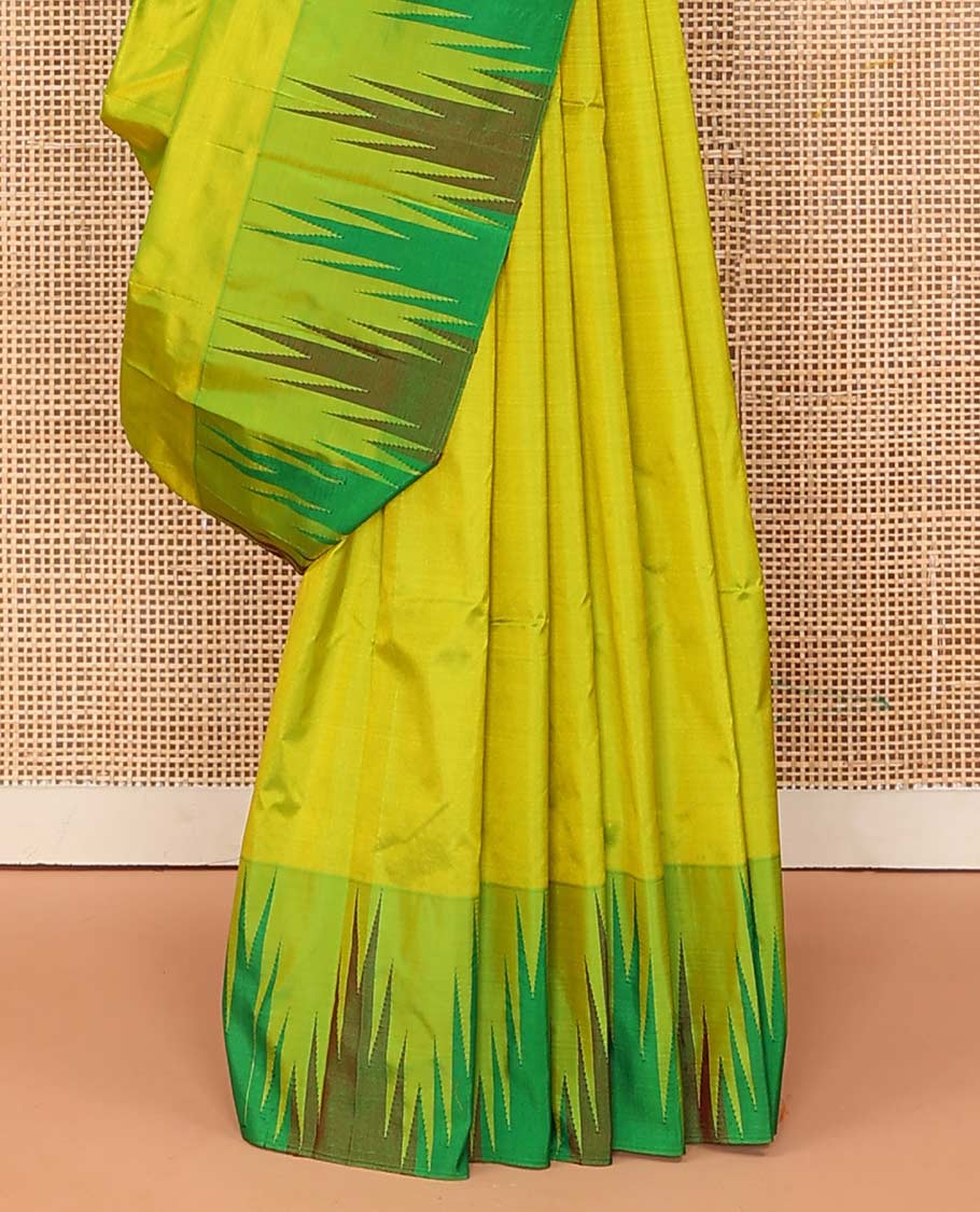 Green plain Bangalore silk saree, contrast temple border, and striped pallu