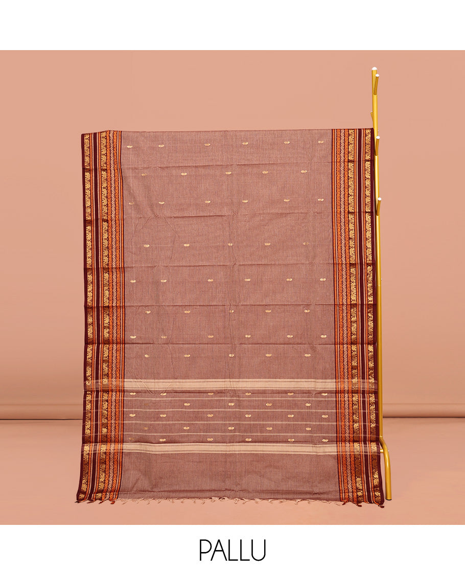 Brown Chettinad Cotton Saree, Subtly Sparkled with Buttas All Over Its Body, Complemented by a Contrast Traditional Zari Design Border, Pallu of Stripes and Buttas, and Paired with a Matching Blouse