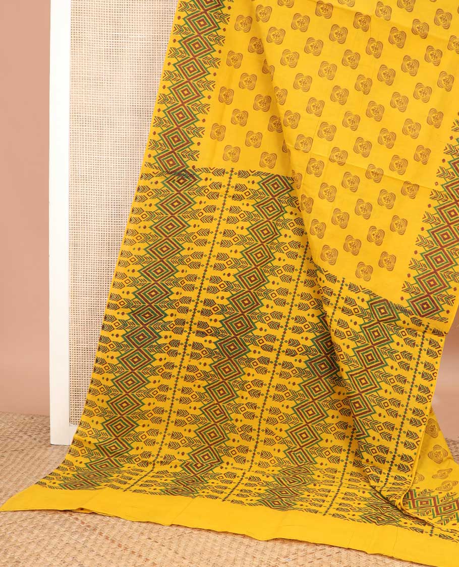 Yellow triangle printed sungudi cotton saree, diamond patterned border, and geometric pallu