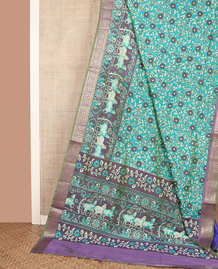 Blue floral vine patola silk saree, contrast traditional zari border and pallu of Pichwai cow and peacock motifs