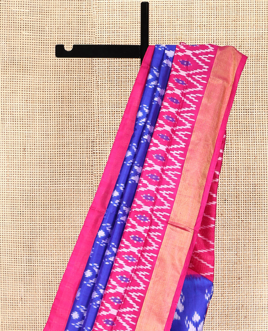Royal Blue Pochampally Ikat Silk Saree, Adorned with Ikkat Buttas on Its Body, Complemented by a Contrast Ikkat-Style Woven Border, Pallu of Butta Enclosed Jaal Design, and Paired with a Contrast Blouse