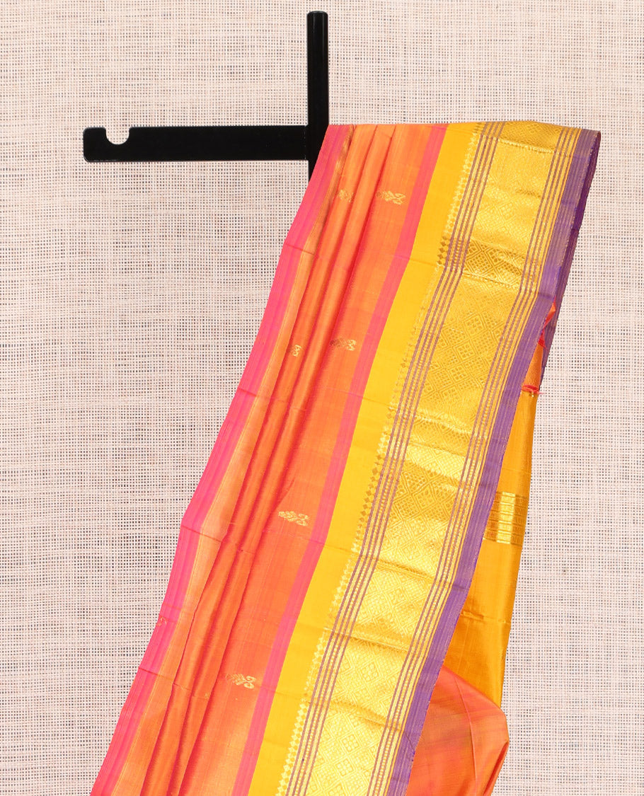 Orange Kanchipuram Silk Saree, Finely Crafted with Zari Buttas, a Contrast One-sided Border of Panner Sombu, Banaras, Muthu, and Jaal Designs, Zari Woven Pallu, and No Blouse