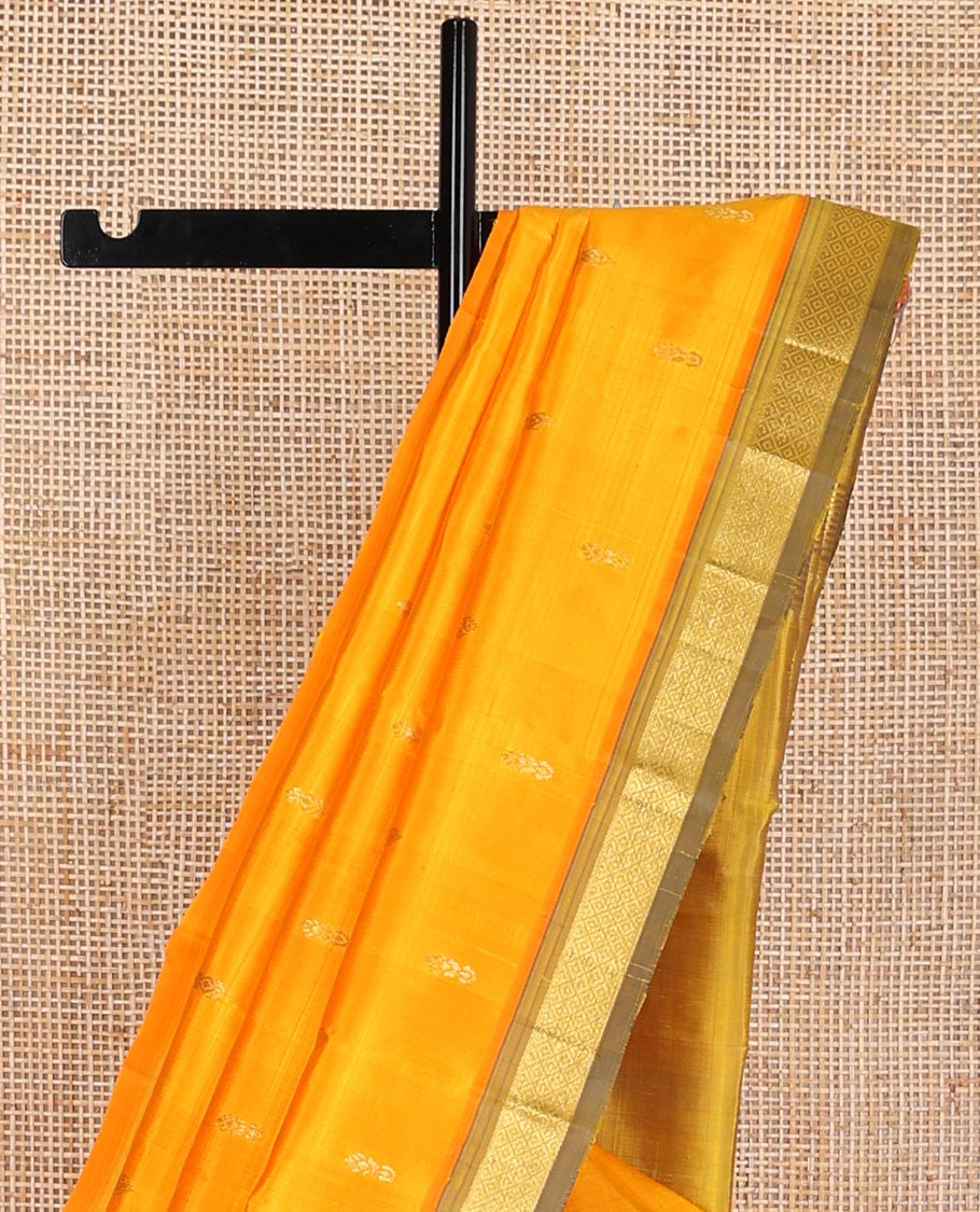 orange buttas kancheepuram silk saree with contrast intricate zari design border & floral design pallu