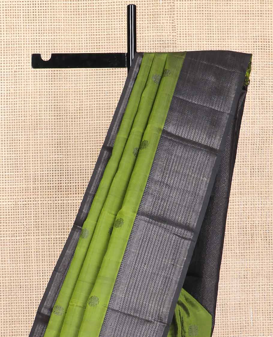 Green buttas kancheepuram silk saree with self border of thilakam mokku, muthu, banaras design & zari design pallu