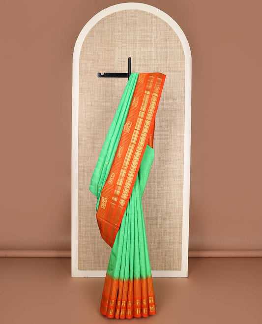 Green zari buttas silk saree, contrast one-sided temple rettai pettu border of salangai,banaras,rettai neli & chakram & intricate pallu