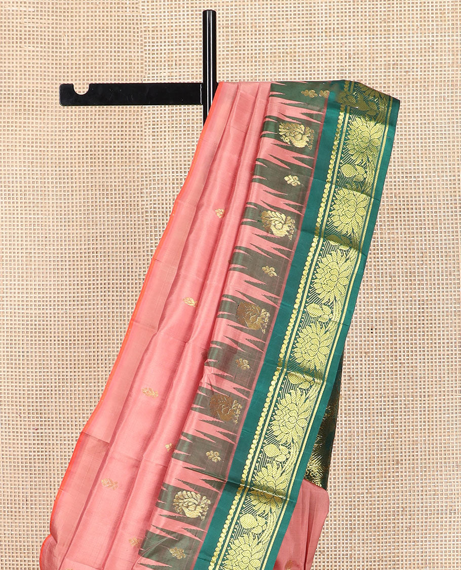 Pink zari buttas Kanchipuram silk saree, contrast thazampoo rekku border of salngai, and kamalam designs, and intricate pallu