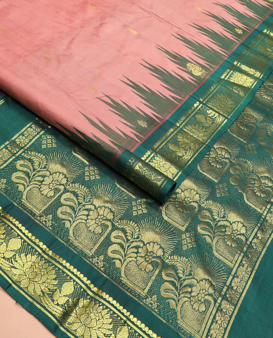 Pink zari buttas Kanchipuram silk saree, contrast thazampoo rekku border of salngai, and kamalam designs, and intricate pallu