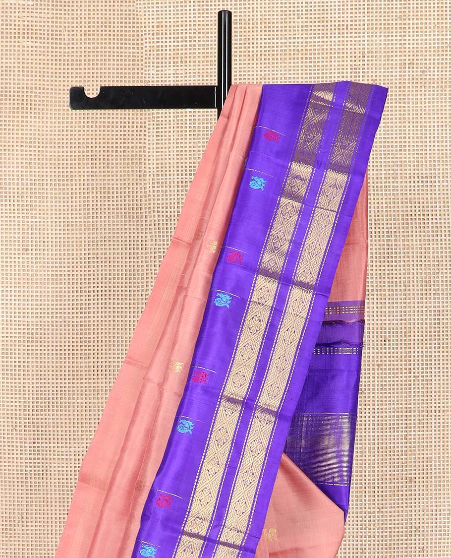Peach zari buttas Kanchipuram silk saree, contrast one-sided thazampoo rekku border of thread mayil motifs and zari rettai pettu design, and zari design pallu