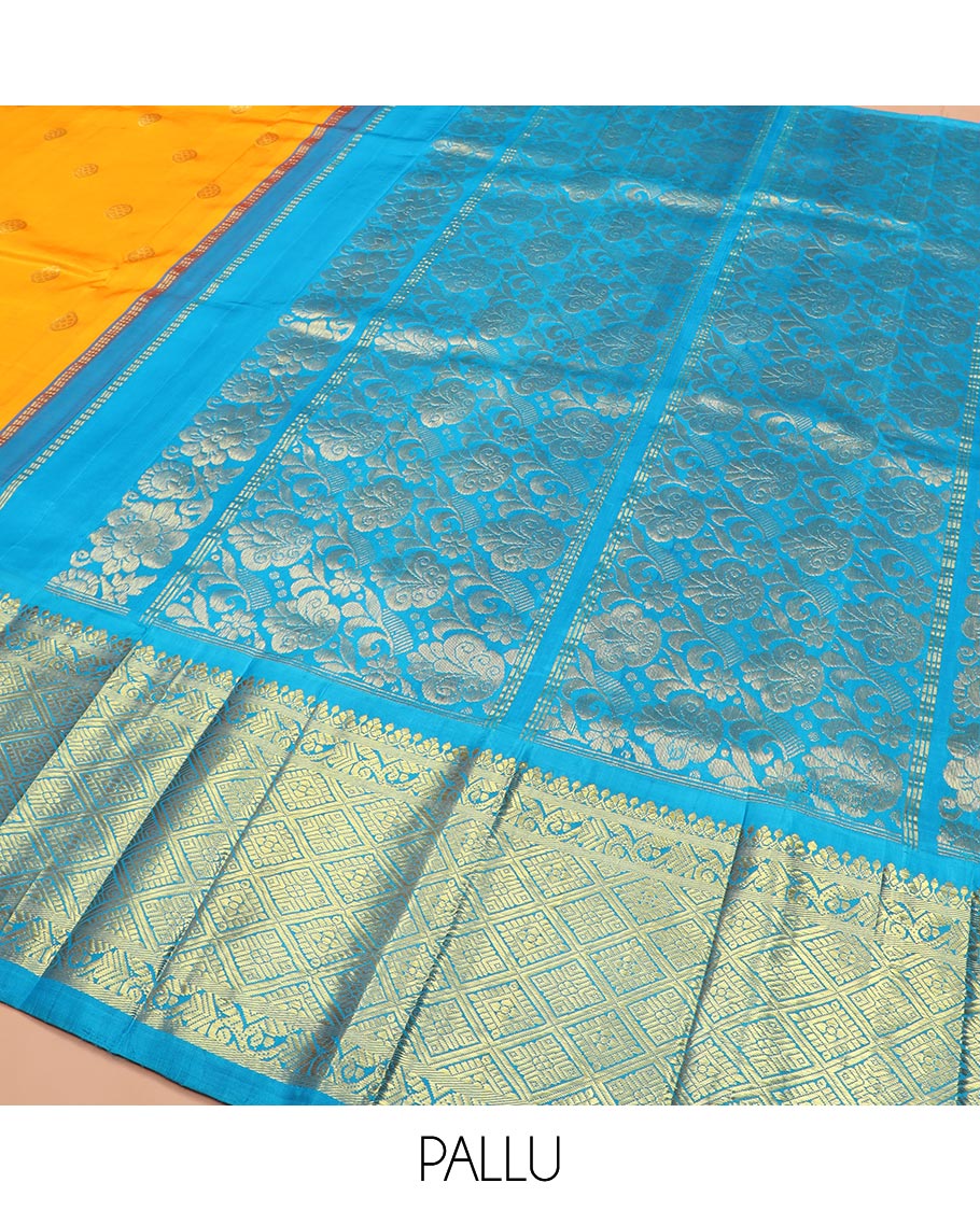 Yellow Kanchipuram Silk Saree Meticulously Woven with Zari Buttas All Over Its Body, Complemented by a Contrast One-Sided Korvai Border of Jaal Designs, Richly Woven Pallu of Intricate Motifs in Zari, and Comes Without a Blouse