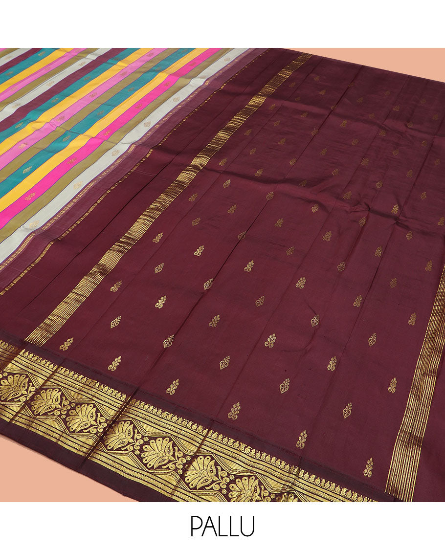 Multi-Color Kanchipuram Silk Saree Majestically Detailed with Stripes and Zari Buttas, Highlighted by Contrast One-Sided Korvai Border of Traditional Zari Designs, Grandly Woven Pallu of Zari Design, and Comes Without a Blouse