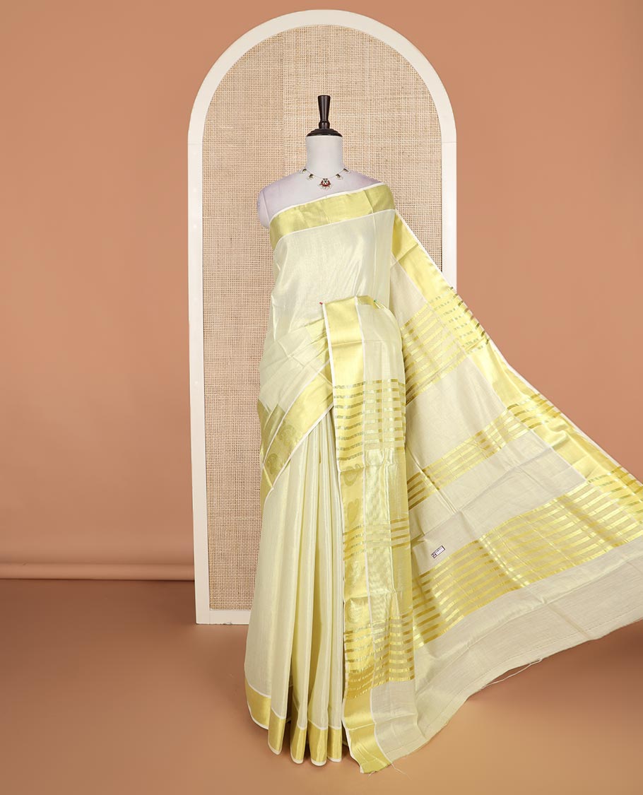 Cream plain Kerala cotton saree, zari border of temple, and zari paisley motifs, and zari striped pallu