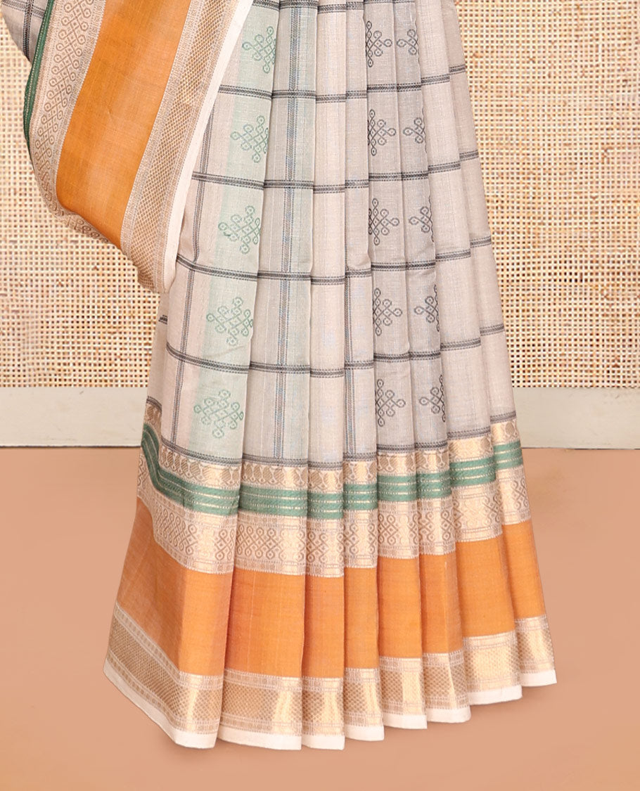 Cream Buttas Enclosed Checked Kuppadam Silk Saree, a Contrast Double-Pet Border, Grand Pallu, and a Matching Blouse