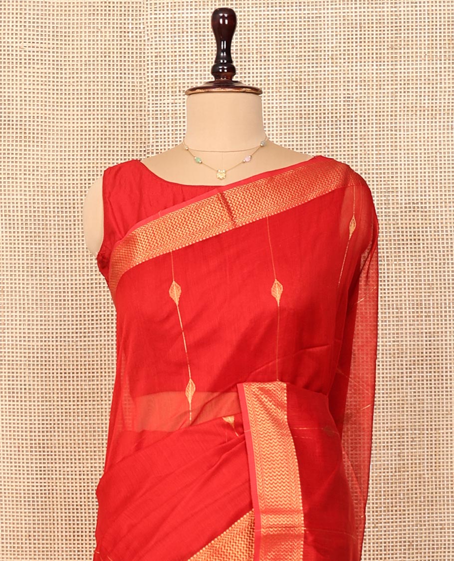 Red Maheshwari Cotton Saree, Accentuated with Diamond Stripes on Its Body, Highlighted by Zari Border of Chevron Designs, Gleaming Pallu Steeped with Zari Stripes, and Paired with a Matching Blouse
