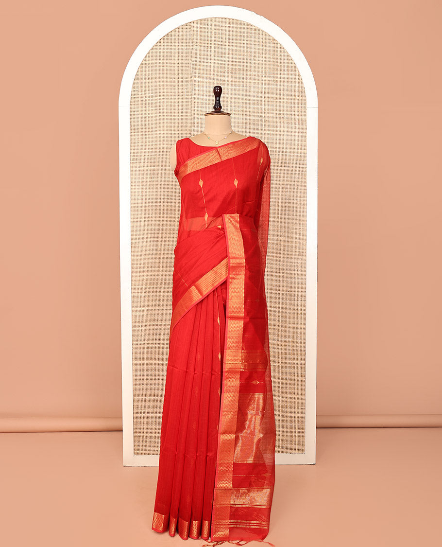 Red Maheshwari Cotton Saree, Accentuated with Diamond Stripes on Its Body, Highlighted by Zari Border of Chevron Designs, Gleaming Pallu Steeped with Zari Stripes, and Paired with a Matching Blouse