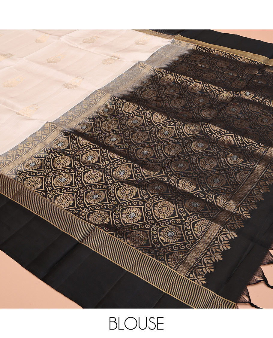 White Mayuri Soft Silk Saree, Enthralled with Zari Buttas, Complemented by Contrast Zari Border, Intricately Designed Pallu, and a Contrast Blouse