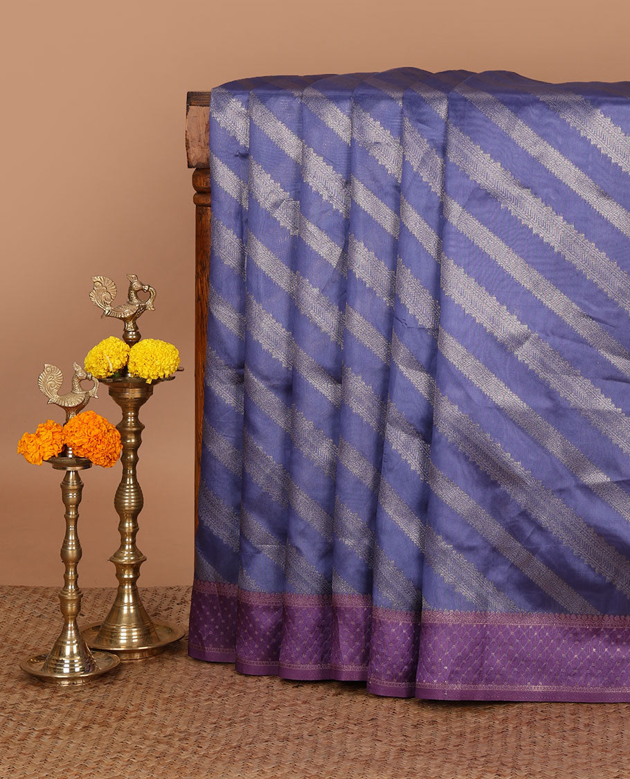 Violet golden zari striped burberry silk saree, contrast zari border & pallu features 1000 dobby-style buttas