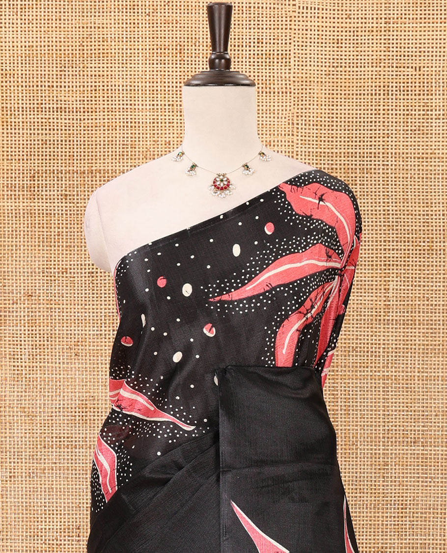 Black-base plain body khadi cotton saree with batik-style orange-color floral & dots printed on its border & pallu, plain black blouse