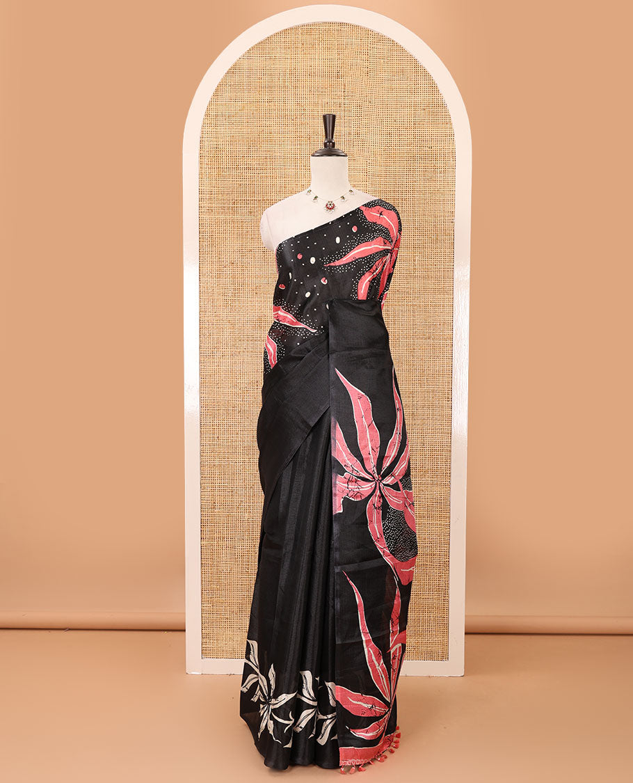 Black-base plain body khadi cotton saree with batik-style orange-color floral & dots printed on its border & pallu, plain black blouse