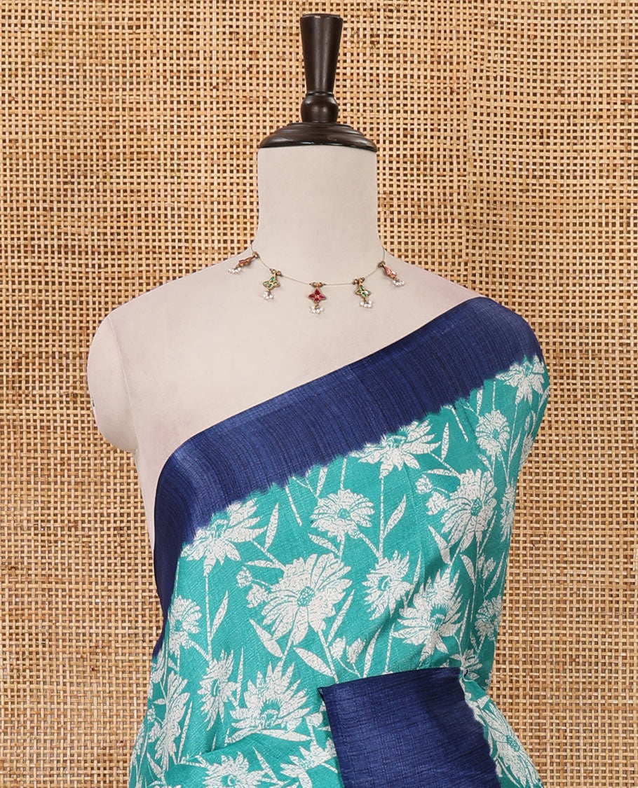 Rama green sunflower motifs printed Khadi cotton saree, contrast plain border, patola geometric printed pallu & contrast blouse