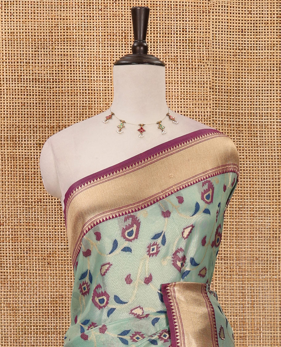 Sea green floral & paisley vine tissue silk saree, contrast temple border, paithani-style peacock & muniya pallu & contrast zari buttas blouse