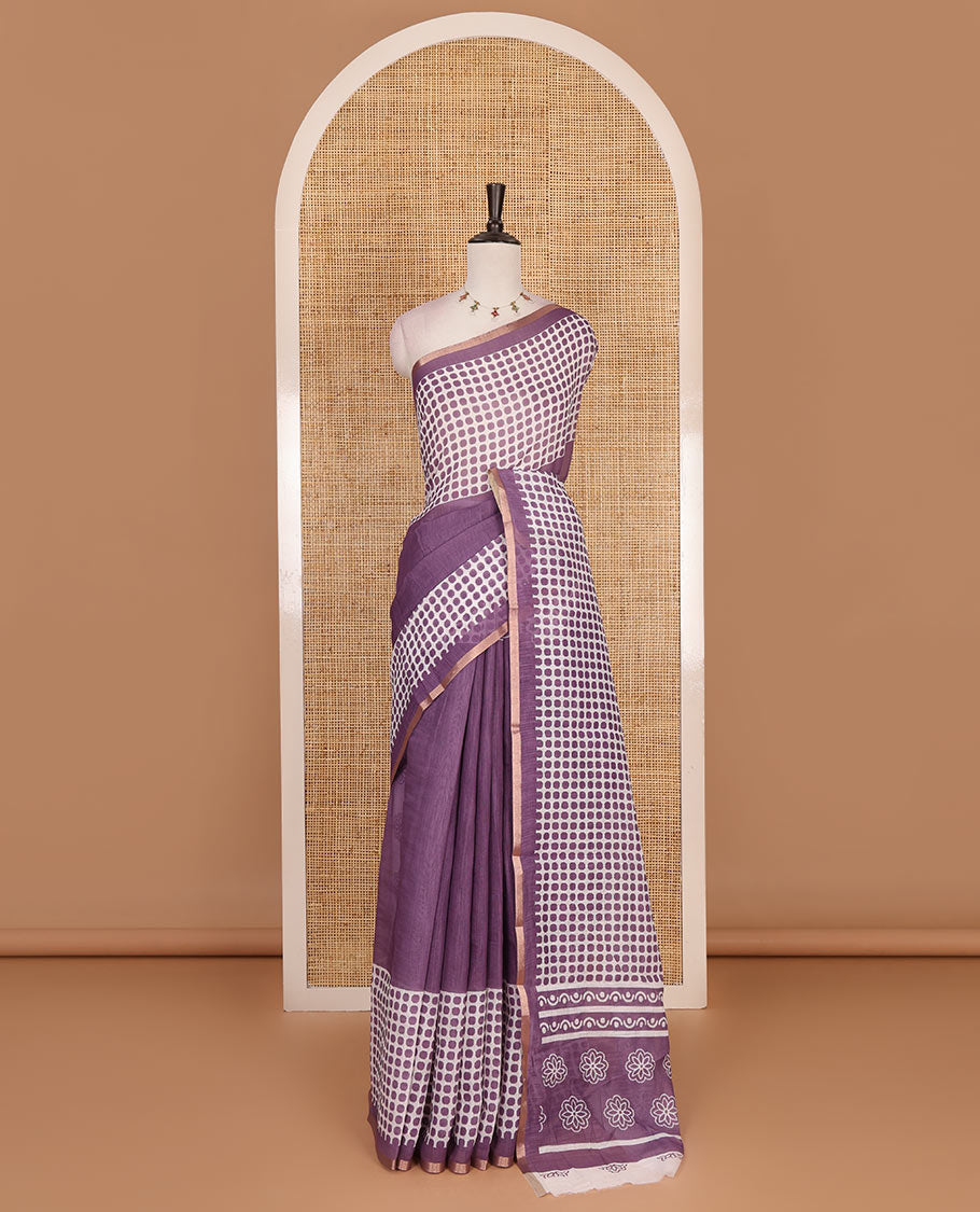 Lavender plain and polka dots printed linen cotton saree with piping zari border, floral-geometric print pallu, and contrast flower buttas printed blouse