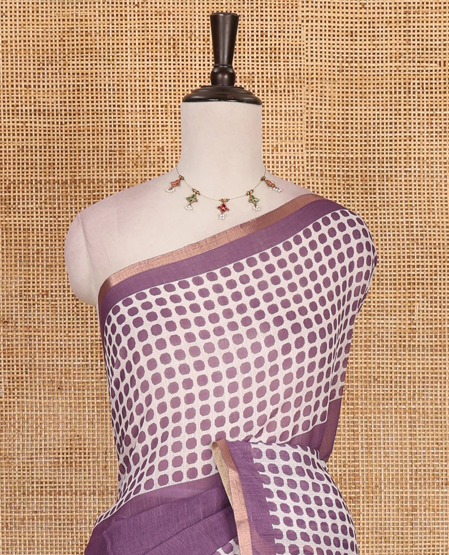 Lavender plain and polka dots printed linen cotton saree with piping zari border, floral-geometric print pallu, and contrast flower buttas printed blouse