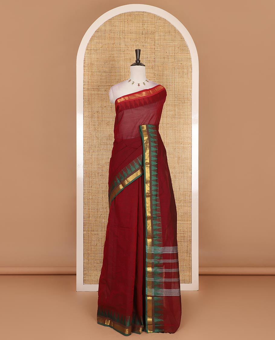 Maroon plain Chettinad cotton saree, contrast ganga jamuna temple zari border, striped pallu, and plain blouse
