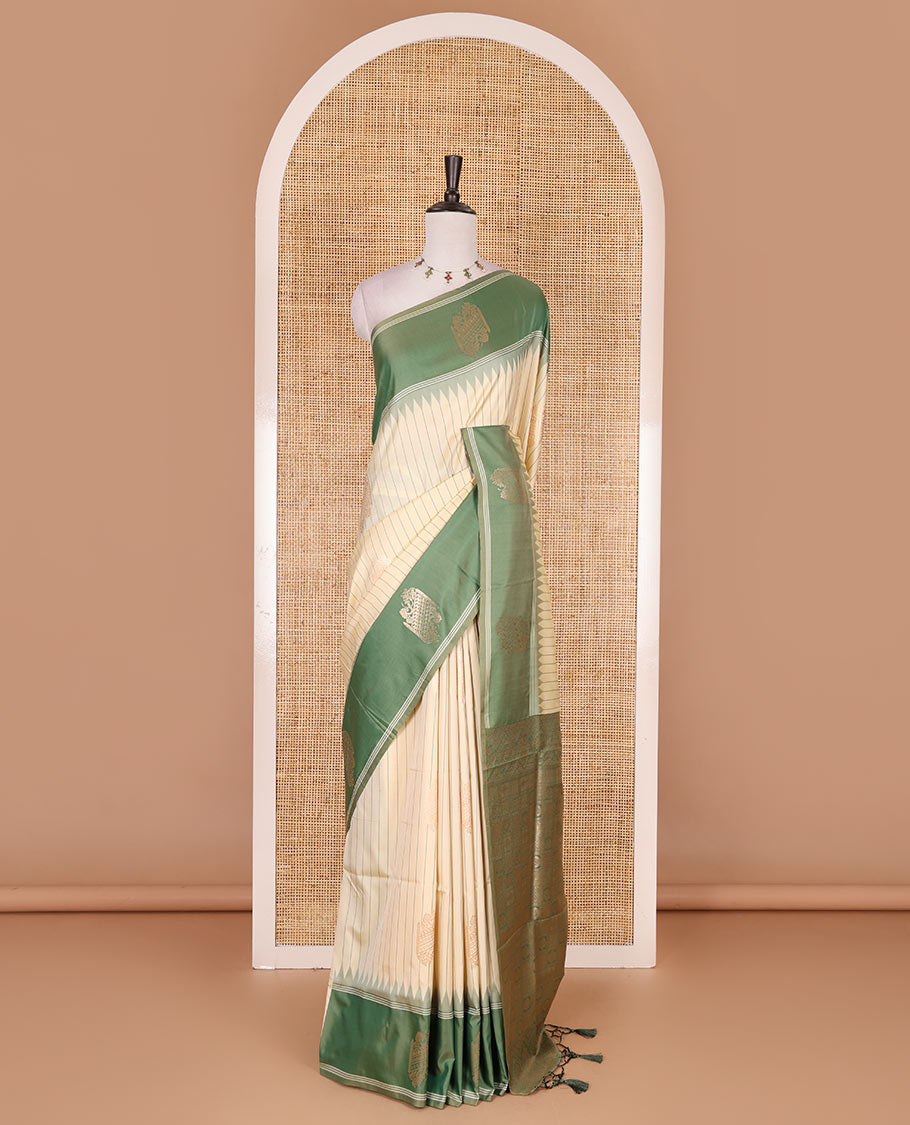 Sandal striped and zari buttas Mulberry silk saree, contrast temple zari buttas border, intricate pallu, and contrast zari design blouse