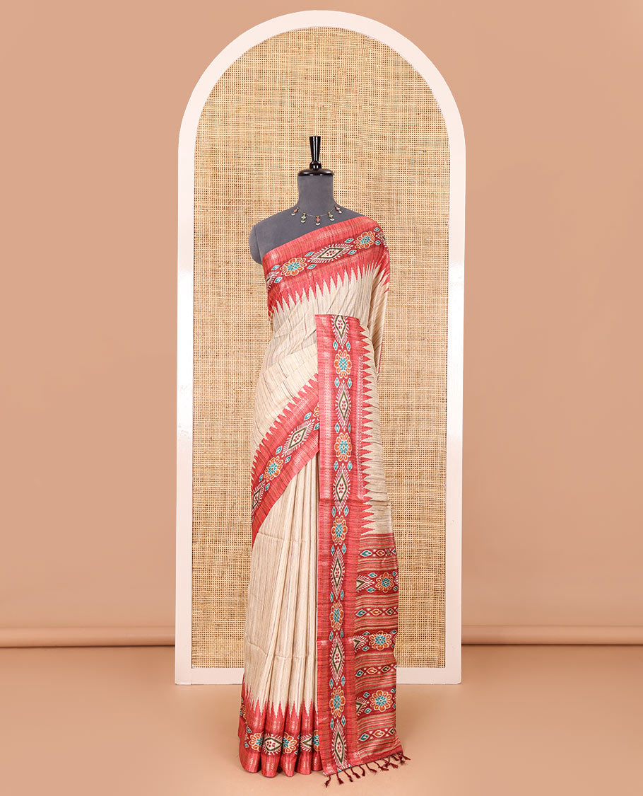 Chikku- maroon plain Katan silk saree, contrast ikkat floral-geometric printed temple border, ikkat printed pallu, and ikkat printed blouse