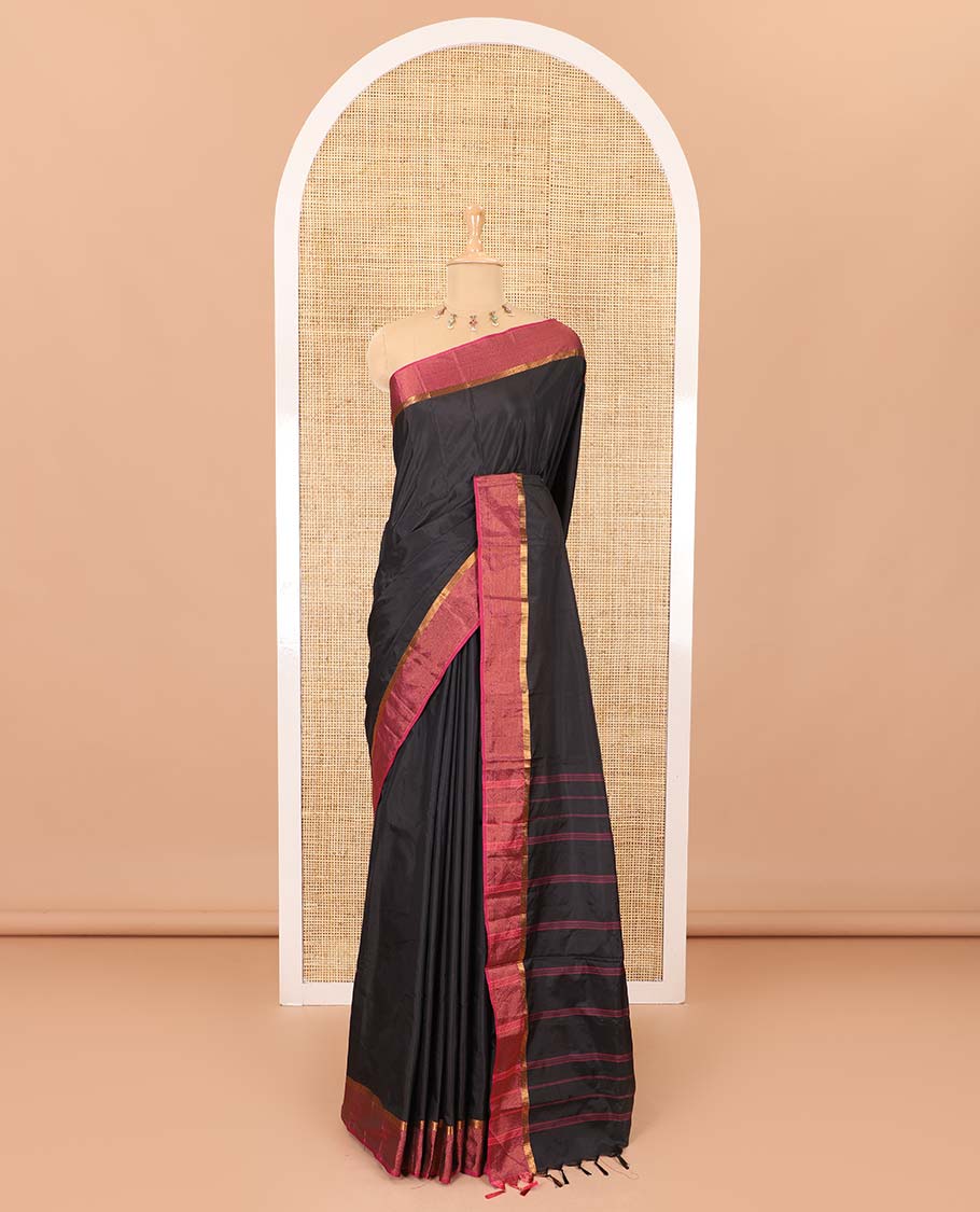 Black plain design semi-soft silk saree, contrast satin striped border, striped pallu, and a matching blouse