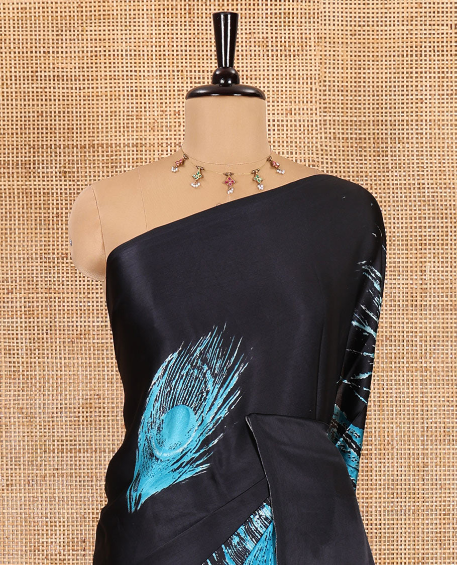 Borderless black and blue peacock feathers style abstract printed Gajji silk saree, peacock feathers printed pallu, and a contrast printed blouse